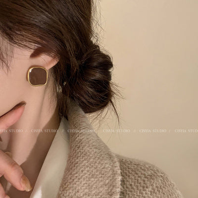 temperament earrings